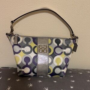 COACH perfectly used condition authentic op art purse. No flaws inside or out.